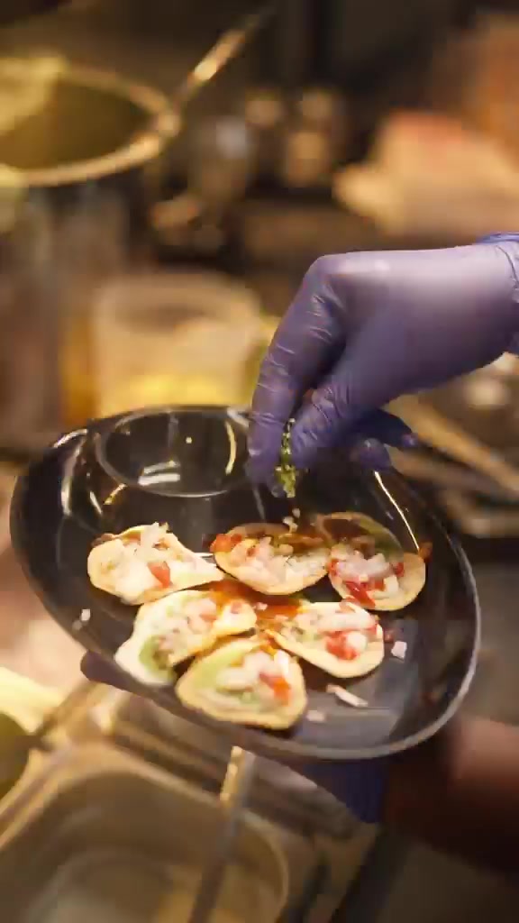 Plates being finished in the Sri Ram Cafe kitchen, Koramangala