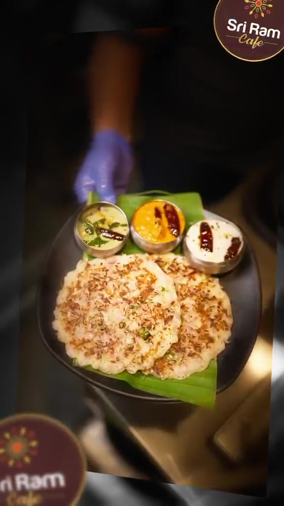 A tiffin plate of ghee onion uttapam with chutneys at Sri Ram Cafe, Koramangala